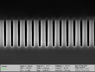 Deposition of Al2O3 on high aspect ratio Si trench structures. The trench height is 1500 nm. Deposition conditions: 100°C and 500 cycles. A Standard “Al2O3” recipe was used.