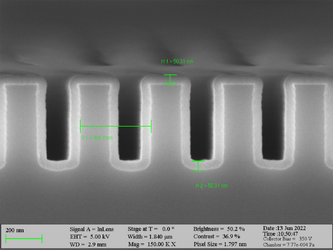 Deposition of Al2O3 on high aspect ratio Si trench structures. The trench height is 500 nm. Deposition conditions: 100°C and 500 cycles. A Standard “Al2O3” recipe was used.
