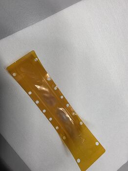 Used Kapton foil that requires cleaning.